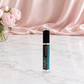 Luma Lips plumping lip gloss on a vanity